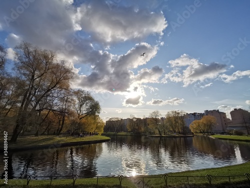 Autumn landscape in a city park, with reflection in the water. (HDR)
