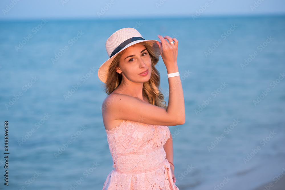 girl with a ball on the beach. young woman in hat on the beach. young woman in pink dress on the beach.
Holidays at sea. girl with a ball on the beach. young woman in hat on the beach. young woman in pink dress on the beach.
Holidays at sea.