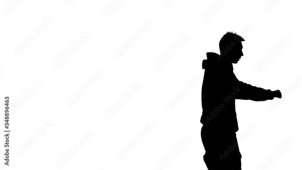 black silhouette on a white background, young energetic guy dancing hip hop, freestyle, street dance. Medium long shot black silhouette on a white background, young energetic guy dancing hip hop, freestyle, street dance. Medium long shot
