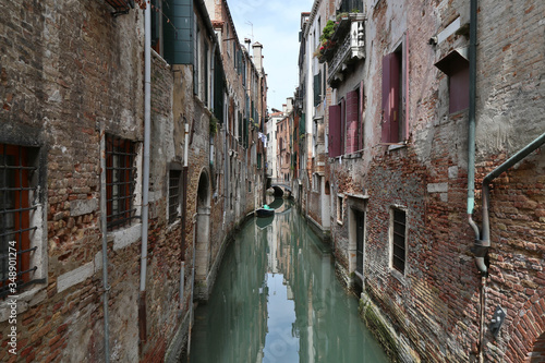 Typical houses along a canal in Venice, Italy 