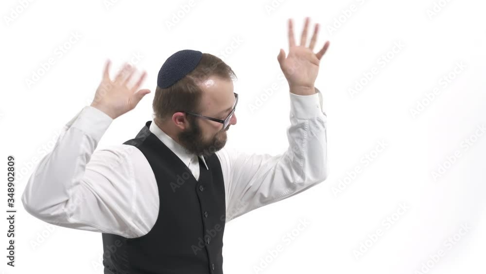 Close-up of male Jew dancing traditional Jewish dance. Cultural, national, ethnic concept. Isolated, on white background Close-up of male Jew dancing traditional Jewish dance. Cultural, national, ethnic concept. Isolated, on white background