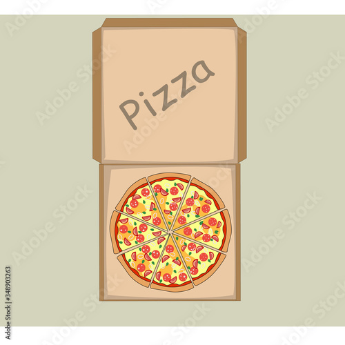 Pizza in a box with sausage, cheese and vegetables