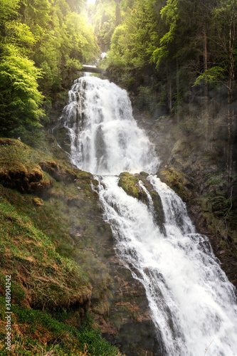 Idyllic waterfall in forest crashing over rocks. Famous Waterfalls Giessbach in the Bernese Oberland near Brienz, Switzerland.