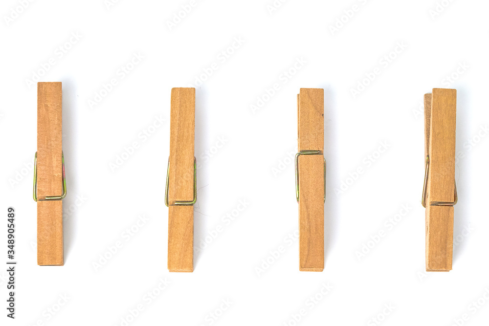 Wooden clothes peg isolated on white background Wooden clothes peg isolated on white background