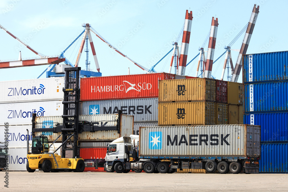Hyster Container Handler Lifting Shipping Container Off A Truck And hyster-container-handler-lifting-shipping-container-off-a-truck-and