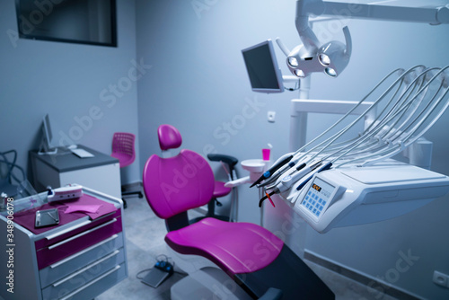 Fototapeta Naklejka Na Ścianę i Meble -  Modern dental practice. Dental chair and other accessories used by dentists.