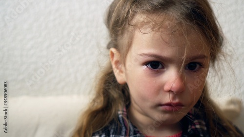 Mistreated child. Little girl upset. Child abuse and crying kid.