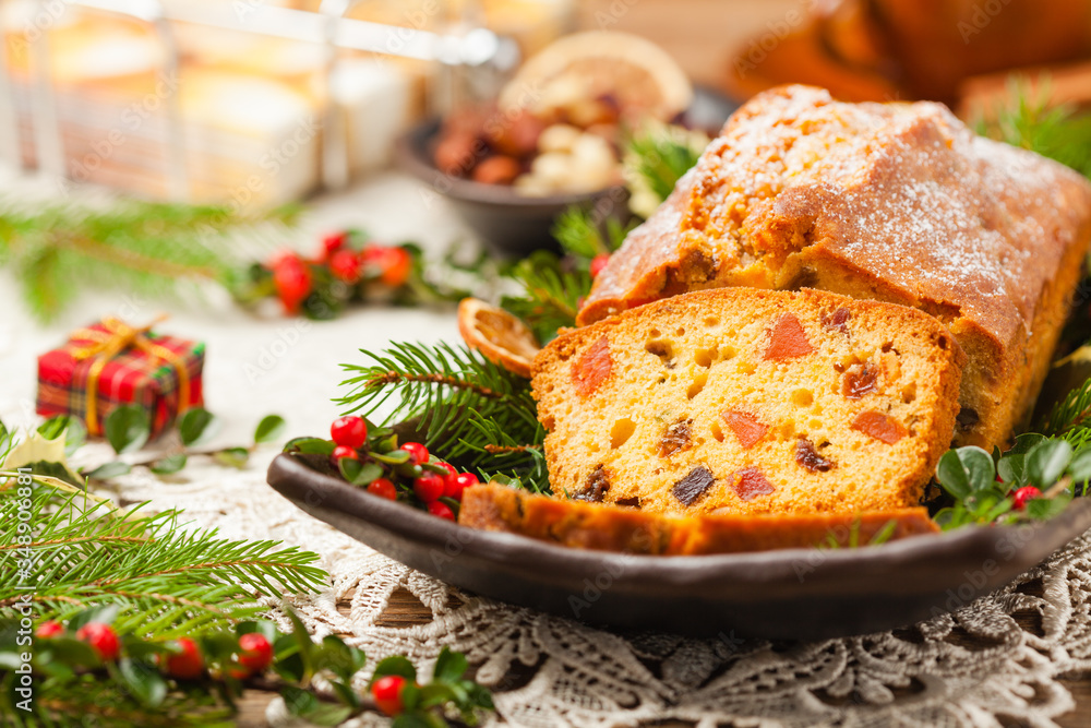 Christmas fruitcake. Natural wooden background. Christmas fruitcake. Natural wooden background.