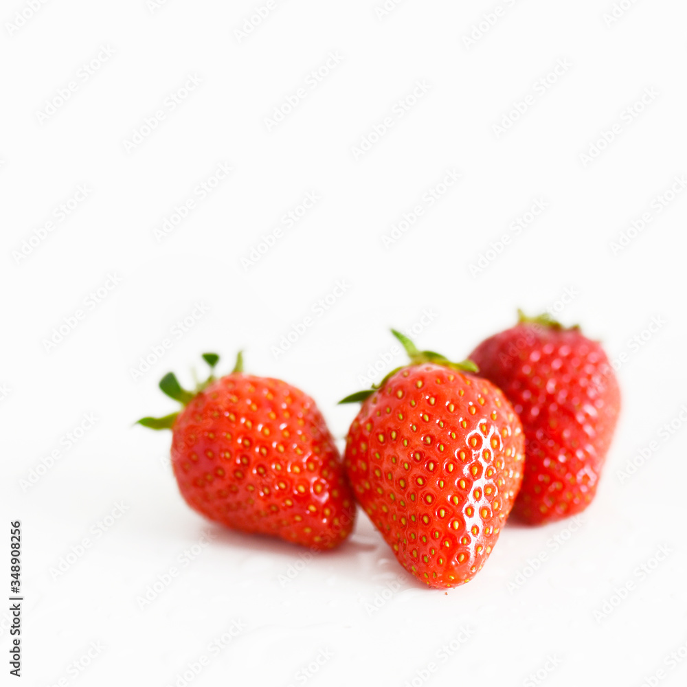 fresh strawberries bright red new crop on a white background fresh strawberries bright red new crop on a white background