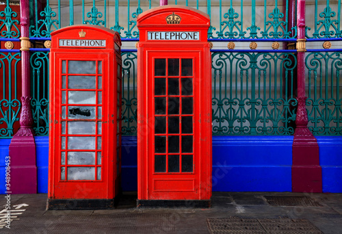 Two red iconic phone boxes in central London  United Kingdom.