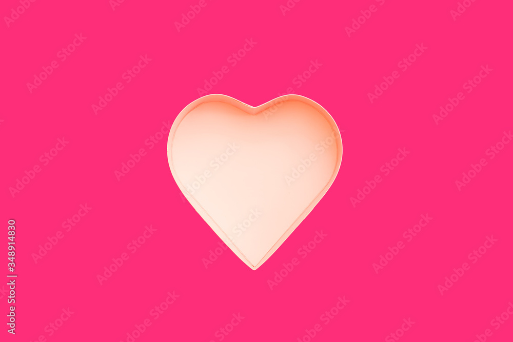 Pink heart gift box for Valentine's day on a pink background. Flatley Valentine's Day concept