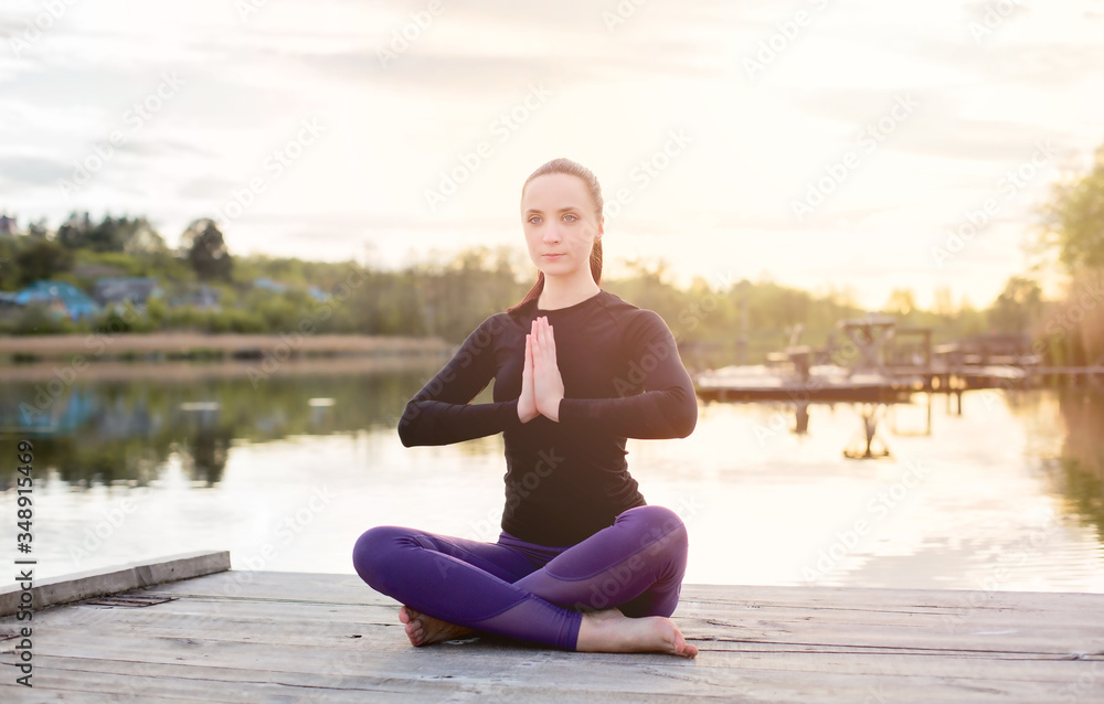 Happy Young Woman do Yoga on Nature Happy Young Woman do Yoga on Nature
