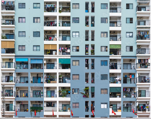Canvas Print Blue appartment building facade with balconies in Halong Vietnam