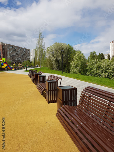 Beautiful boulevard with wooden benches in Zelenograd in Moscow, Russia