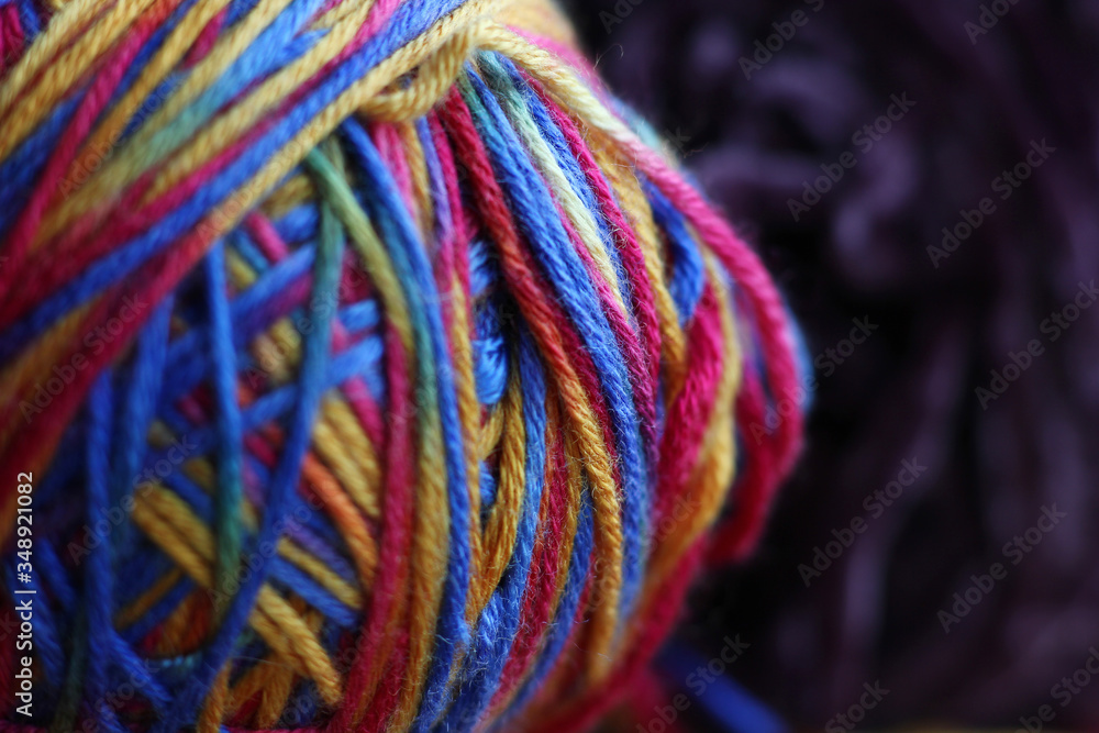 wool yarn for knitting from colored thread close up
