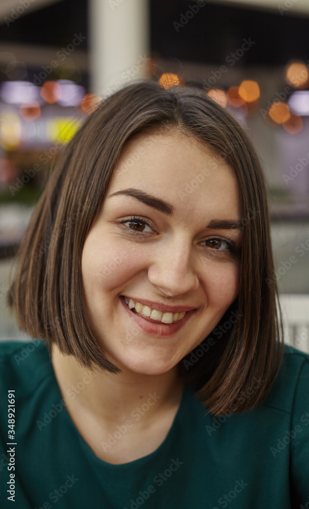 Woman smiling with perfect smile in mall and looking at camera. Image for your stories. Woman smiling with perfect smile in mall and looking at camera. Image for your stories.