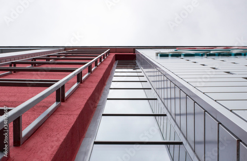 Urban geometry looking at a glass building. Modern architecture, glass and steel. Abstract architectural design. Inspirational, artistic image. Industrial Design. .Modern building.