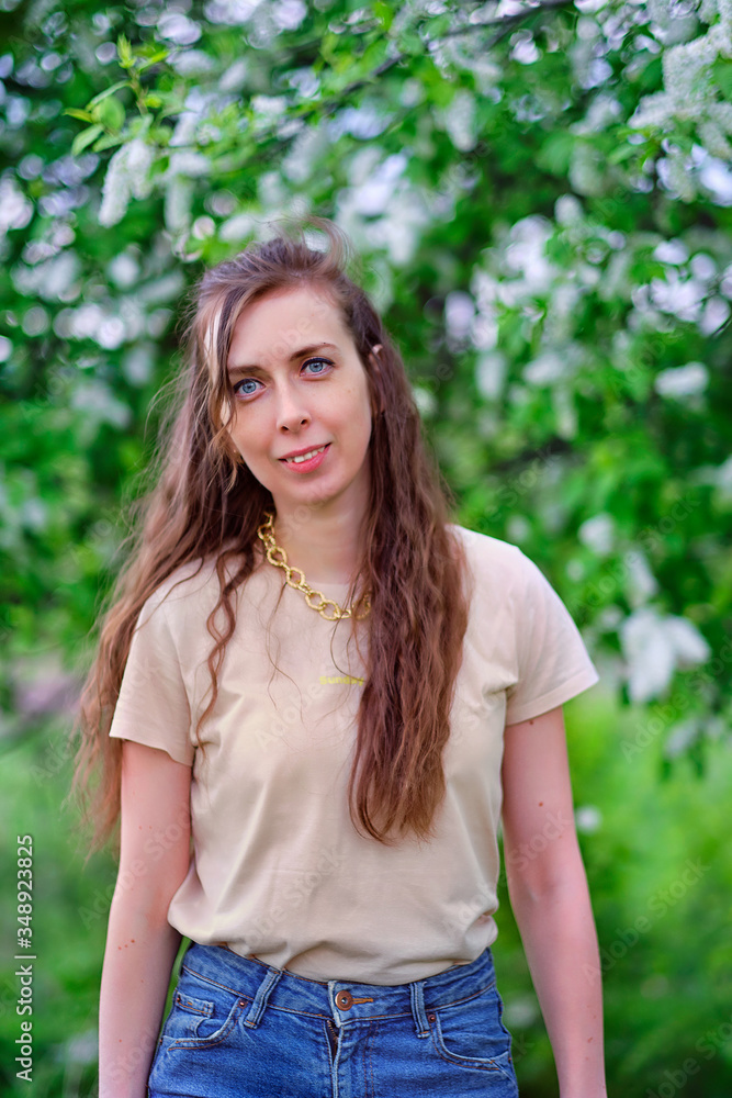 beautiful girl on the background of apple tree beautiful girl on the background of apple tree