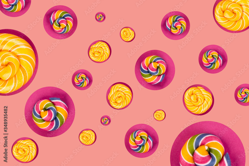 Many lollipops on the background.