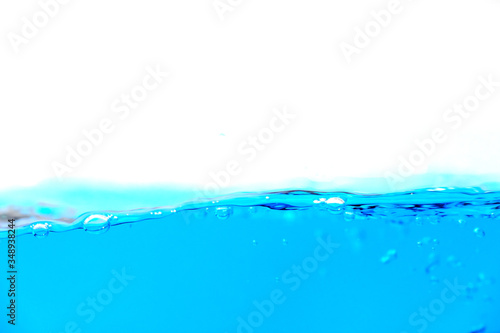Clean blue water splash with bubbles of air on white background