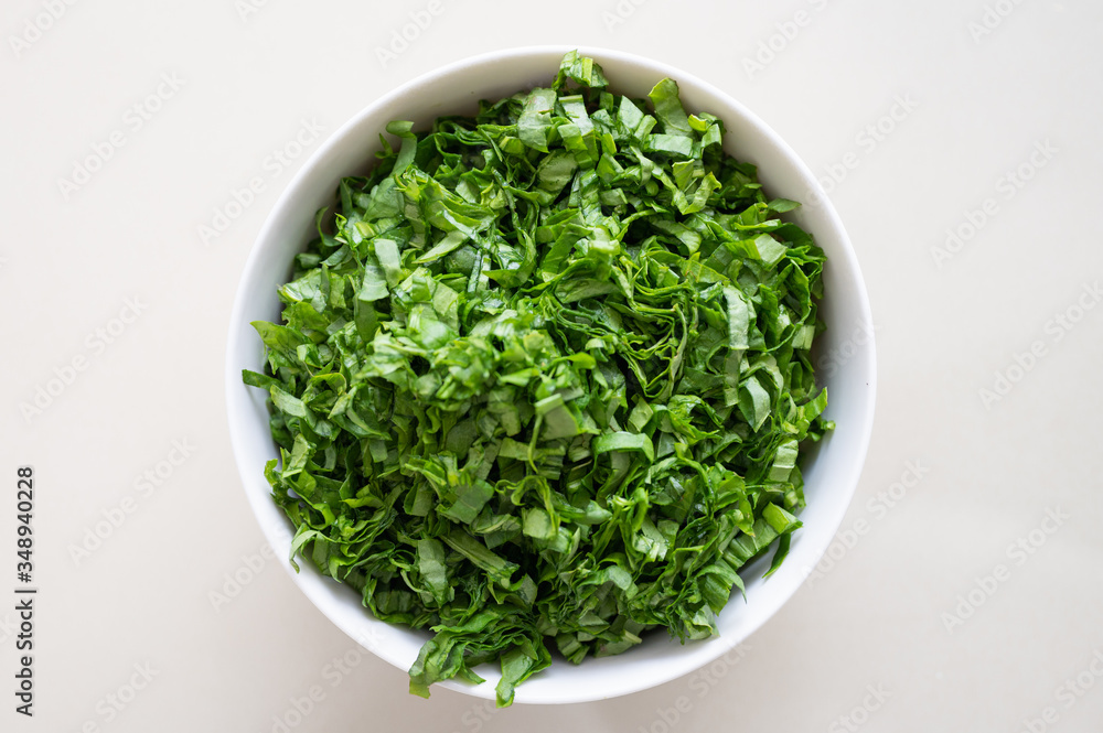 white plate with herbs. The concept of vegetarianism. white plate with herbs. The concept of vegetarianism.