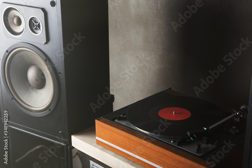 HiFi system with turntable, amplifier and speakers in a studio