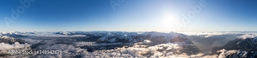 Aerial Panoramic View of Remote Canadian Mountain Landscape during sunny sunrise. Located near Vancouver, British Columbia, Canada. Nature Panorama Background. Authentic © edb3_16