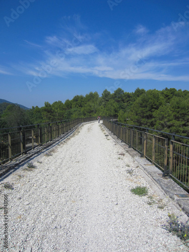 View of the bridge of the mtb bike trail Spoleto Norcia that goes on the track of a former railway  ex ferrovia  in Umbria  Italy