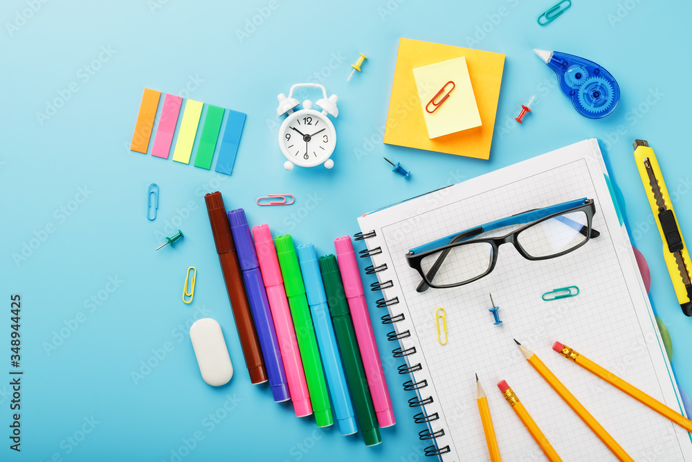 Office supplies are on the blue table, for working with your own hands at home. Office supplies are on the blue table, for working with your own hands at home.