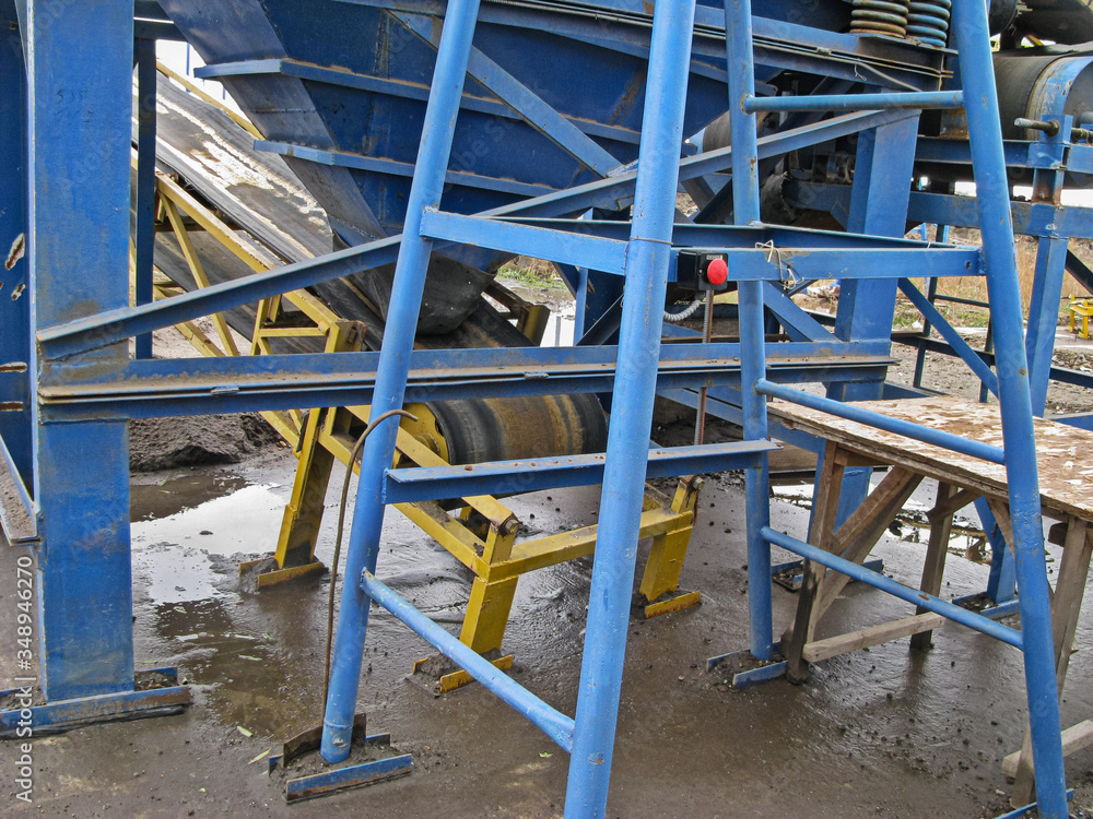 Distribution Hopper, Belt Conveyor and Emergency Stop Button as Part of a Metallurgical Concentration Plant