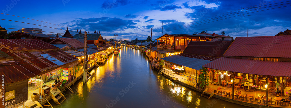 Fototapeta premium Amphawa market canal, the most famous of floating market at sunset and cultural tourist destination on 