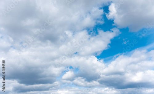 Huge white and grey clouds in the sky.