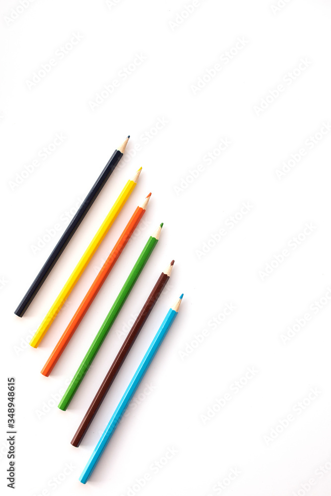 Fototapeta premium colored pencils on a white background