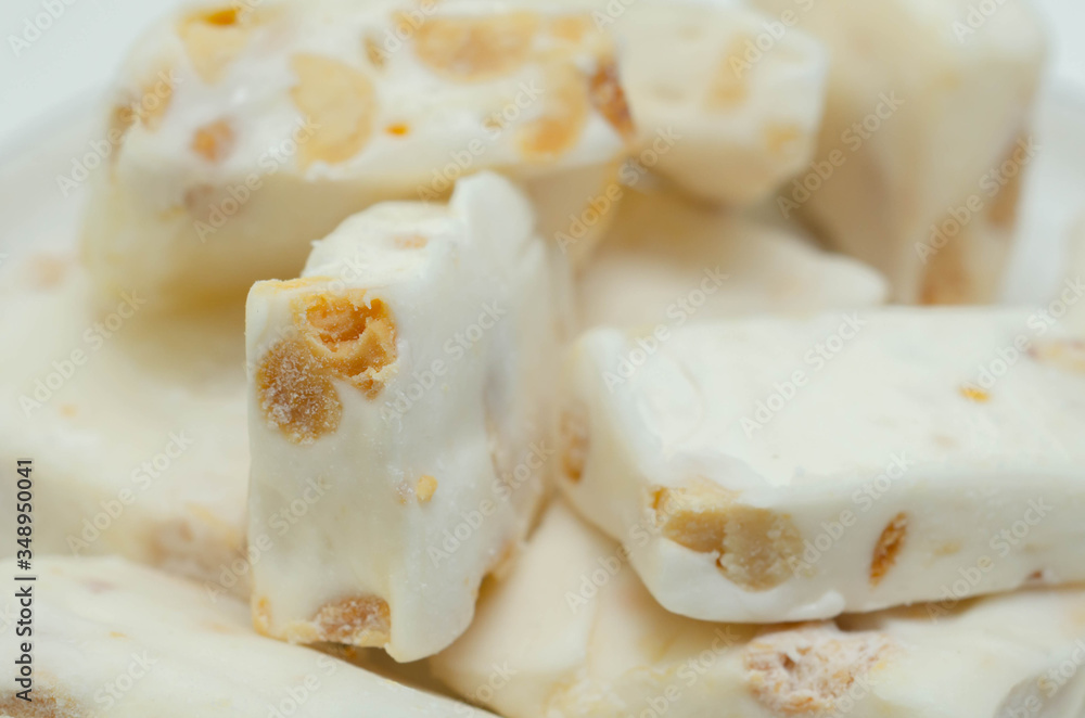 Traditional confections made with sugar or honey, roasted nuts and whipped egg whites Traditional confections made with sugar or honey, roasted nuts and whipped egg whites