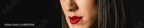 Close up of young woman with nose piercings