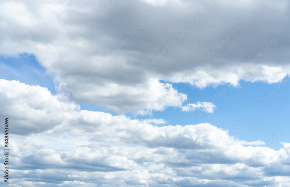 Floaty white, grey clouds running on the sky. Floaty white, grey clouds running on the sky.