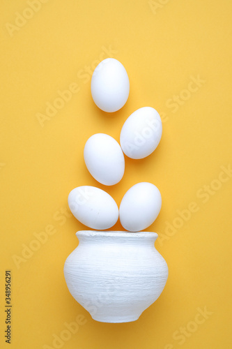 Eggs,Flat lay composition with chicken eggs on color background, space for text photo