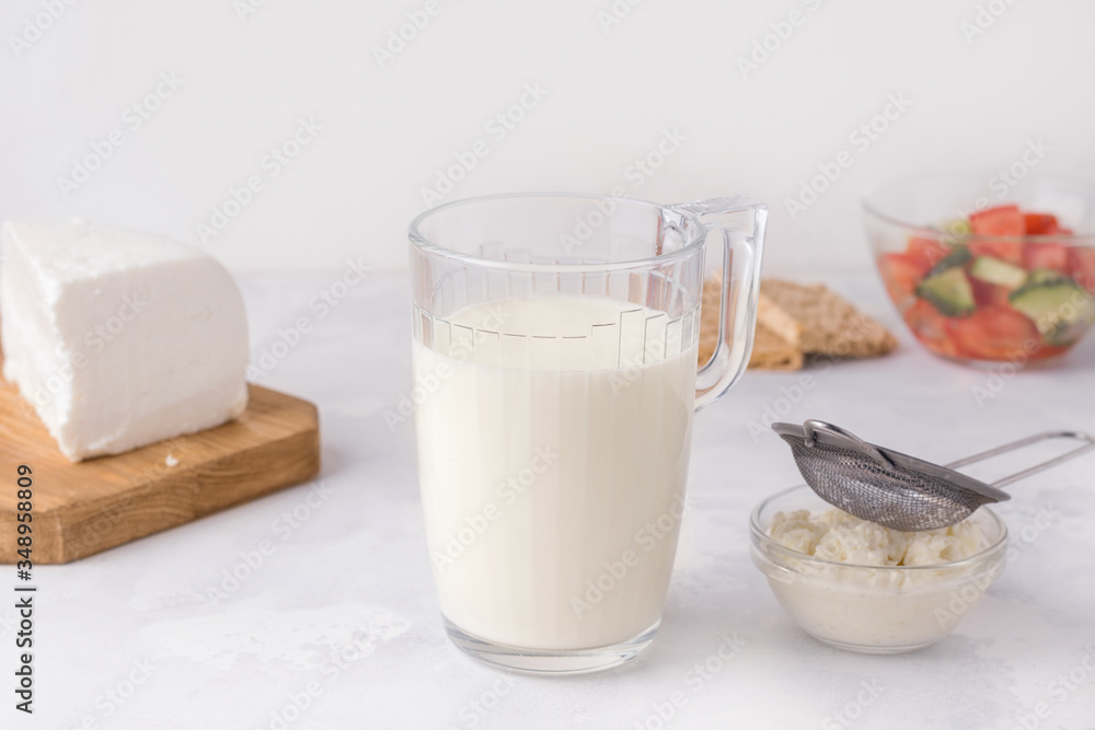 Fermented milk drink kefir in a glass. Healthy breakfast concept Fermented milk drink kefir in a glass. Healthy breakfast concept