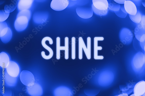 Shine - word on a blue background