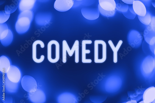 Comedy - word on a blue background