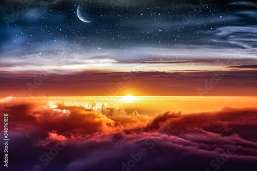 Celestial landscape with sunset of sun and moon