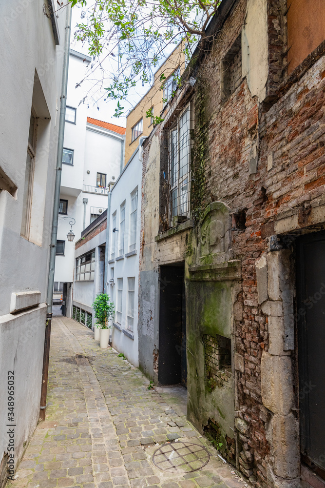Old buildings and narrow street   in Caen, Normandy, France