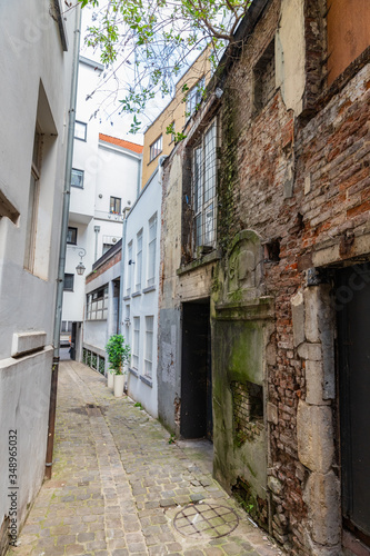 Old buildings and narrow street in Caen, Normandy, France
