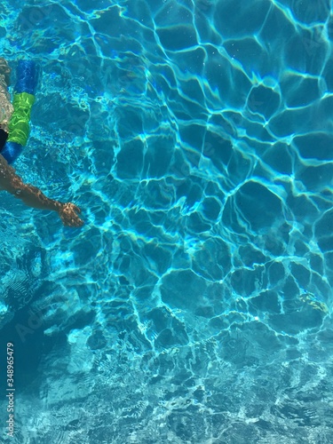woman snorkeling in the pool