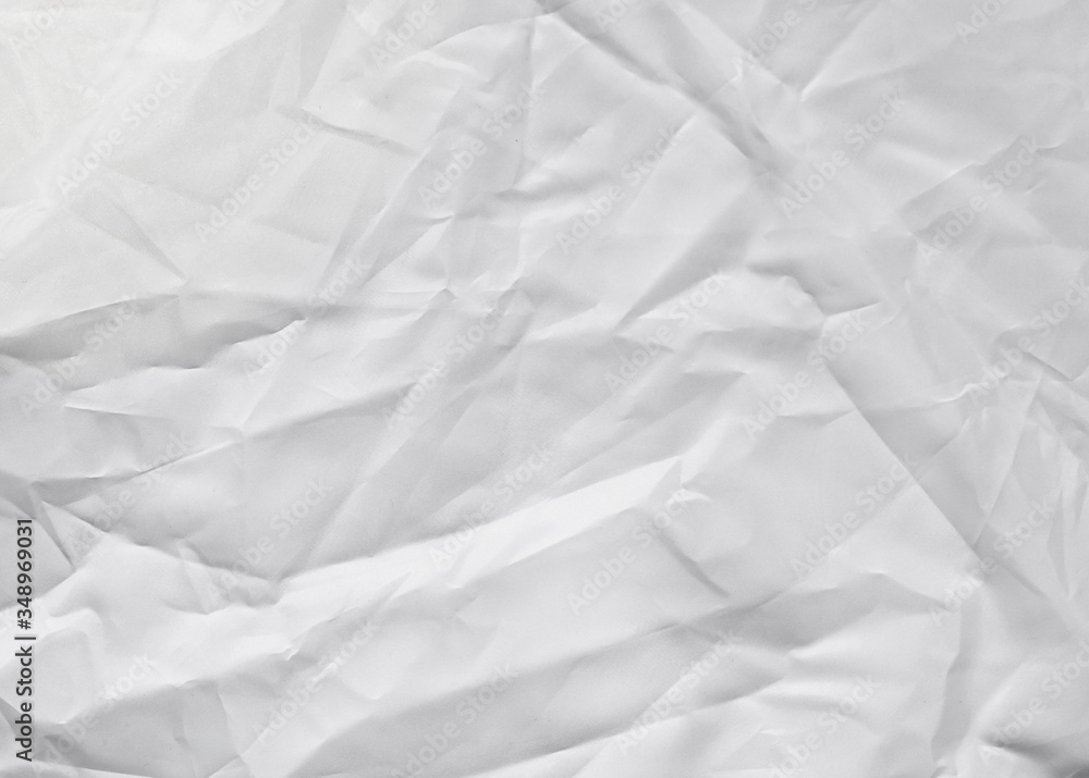 Crumpled white texture, crumpled white fabric, abstract background Crumpled white texture, crumpled white fabric, abstract background