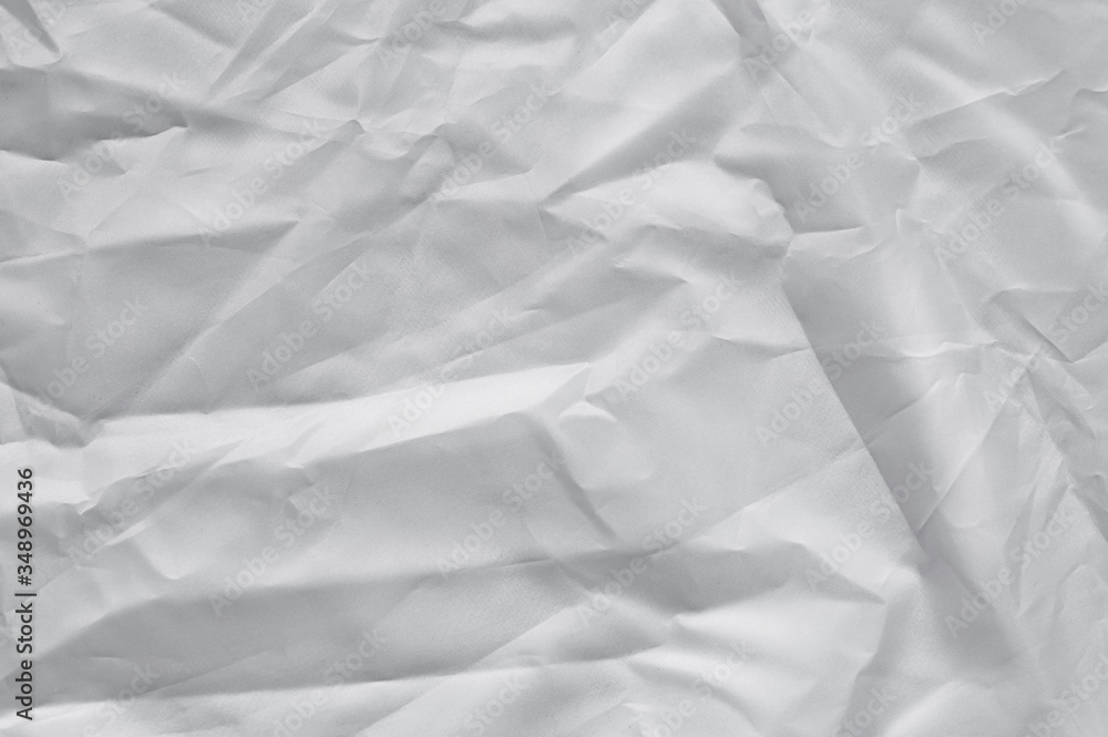 Crumpled white texture, crumpled white fabric, abstract background Crumpled white texture, crumpled white fabric, abstract background