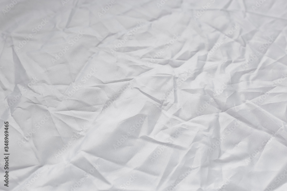 Obraz premium Crumpled white texture, crumpled white fabric, abstract background