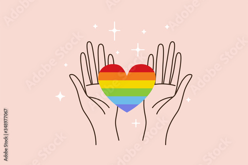 Vector illustration in flat simple linear style - hand and pride LGBT rainbow heart - lesbian gay bisexual transgender love concept