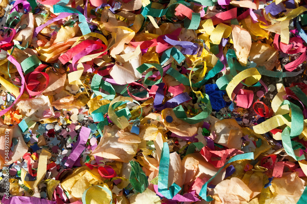 Confetti and colored paper after a wedding