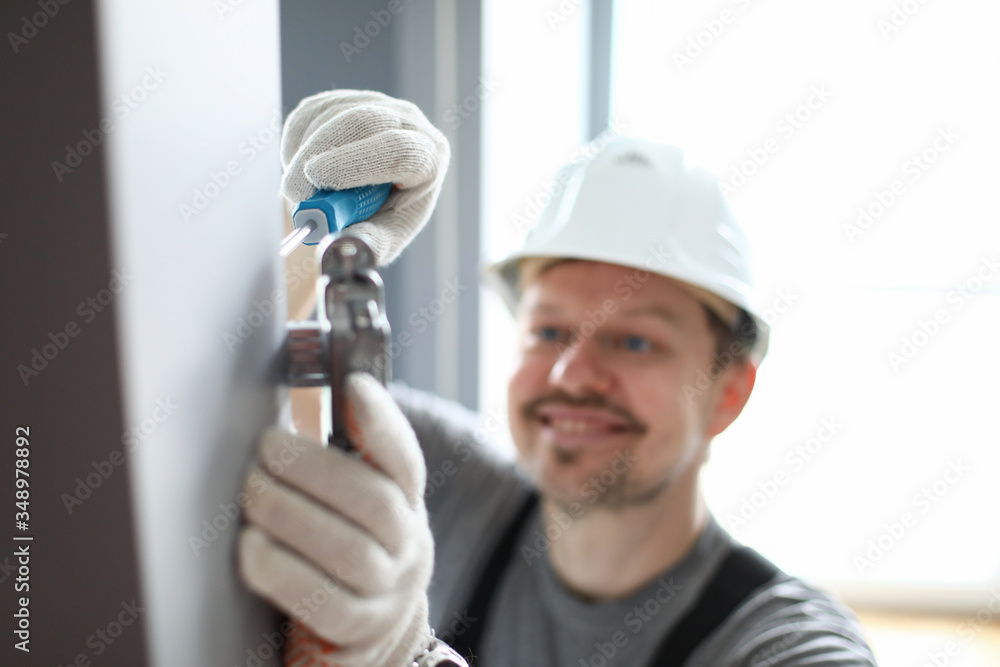 Happy repairman in uniform Happy repairman in uniform